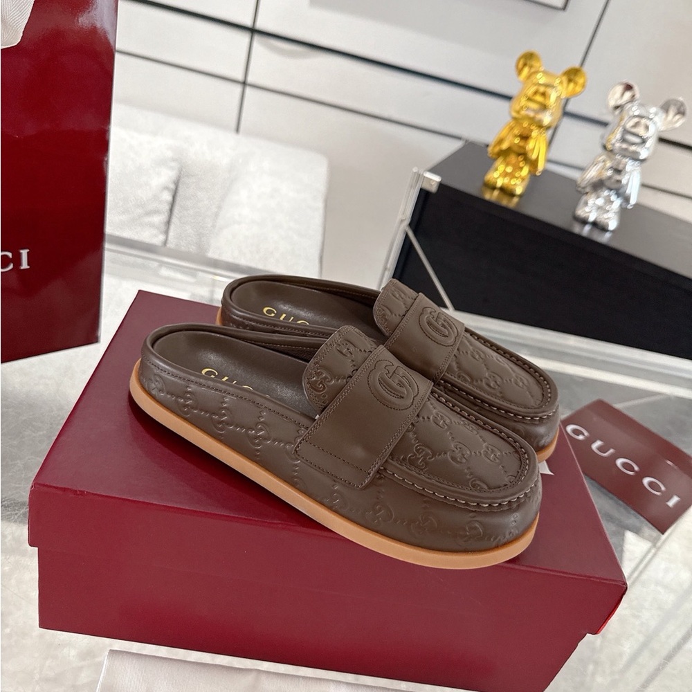 Gucci Embossed Brown Slip-On Loafers
